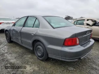 2003 Mitsubishi Galant ES z VIN 4A3AA46G03E180873, wystawiony jako Copart lot #46141195 z przebiegiem 234 709 mil mil oraz Szkoda całkowita • Salvage title. Historia ofert i sprzedaży dostępna na DreamBid. Obrazek 2.
