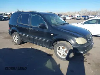 2001 Mercedes-Benz M-Class with VIN 4JGAB54E31A269408, listed as a IAAI auction lot 41642163 with 1 mi miles. Bid and sale history available at carsss.com. Image 1.