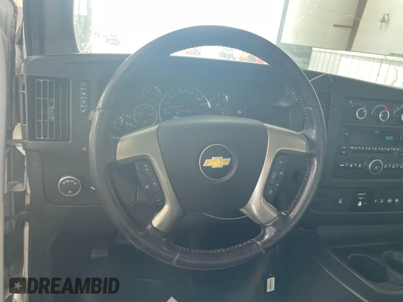 2015 Chevrolet Express Cargo with VIN 1GCWGFCF5F1172987, listed as a IAAI auction lot 42775101 with 159,466 mi miles and . Bid and sale history available at DreamBid. Image 3.