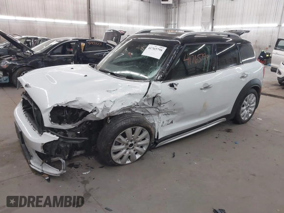 2019 MINI Countryman Cooper S with VIN WMZYT5C57K3G92681, listed as a IAAI auction lot 41765798 with 40,899 mi miles. Bid and sale history available at carsss.com. Image 16.