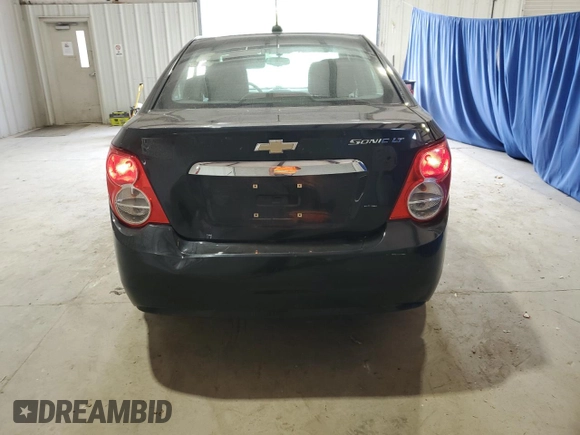 2015 Chevrolet Sonic LT with VIN 1G1JC5SH9F4164028, listed as a Copart auction lot 58870255 with 140,579 mi miles and Clean title. Bid and sale history available at DreamBid. Image 6.