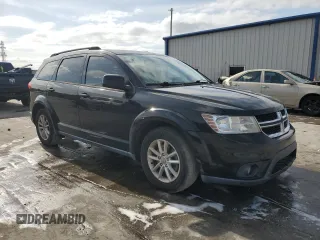 2014 Dodge Journey SXT with VIN 3C4PDCBB5ET198619, listed as a Copart auction lot 54229165 with 167,852 mi miles and Salvage Title. Bid and sale history available at carsss.com. Image 4.