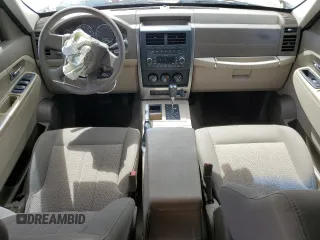 2010 Jeep Liberty Sport with VIN 1J4PP2GK4AW102018, listed as a Copart auction lot 50337815 with 117,385 mi miles and Salvage Title. Bid and sale history available at DreamBid. Image 8.