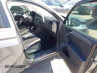 2023 Volkswagen Tiguan SE with VIN 3VV3B7AX5PM142378, listed as a IAAI auction lot 41835204 with 13,670 mi miles and . Bid and sale history available at DreamBid. Image 5.