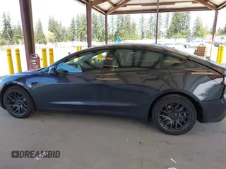 2025 Tesla Model 3 Long Range with VIN 5YJ3E1EA1SF923548, listed as a IAAI auction lot 42046257 with 3,979 mi miles and . Bid and sale history available at carsss.com. Image 14.