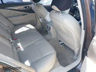 2015 Infiniti Q50 Premium with VIN JN1BV7AR4FM395093, listed as a IAAI auction lot 41907653 with 138,319 mi miles. Bid and sale history available at carsss.com. Image 8.