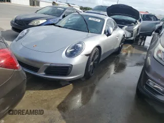 2018 Porsche 911 Carrera with VIN WP0AA2A93JS105437, listed as a Copart auction lot 74474614 with Not Provided miles and Salvage Title. Bid and sale history available at DreamBid. Image 1.