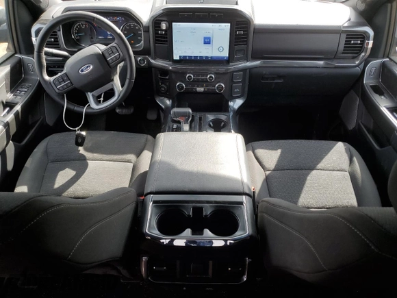 2023 Ford F-150 XL with VIN 1FTEW1EP5PKD18002, listed as a Copart auction lot 49512185 with 23,260 mi miles and Clean Title. Bid and sale history available at carsss.com. Image 8.
