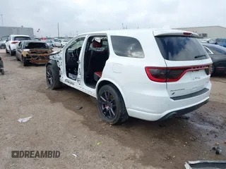 2018 Dodge Durango SRT with VIN 1C4SDJGJ4JC341550, listed as a IAAI auction lot 41525295 with 86,503 mi miles and . Bid and sale history available at DreamBid. Image 3.