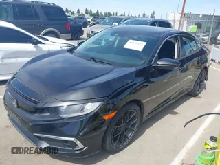 2019 Honda Civic Sedan LX with VIN 2HGFC2F61KH510012, listed as a IAAI auction lot 42073212 with 86,487 mi miles. Bid and sale history available at carsss.com. Image 2.