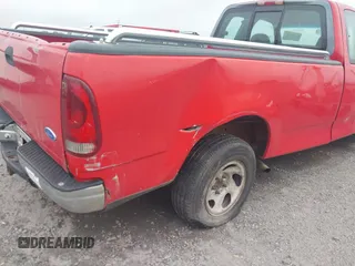1997 Ford F-150 with VIN 1FTDX1724VKB63174, listed as a IAAI auction lot 42494621 with 205,978 mi miles and . Bid and sale history available at DreamBid. Image 6.