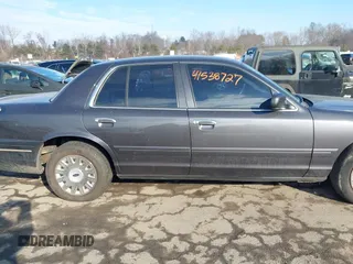 2005 Ford Police Interceptor z VIN 2FAHP71W95X170821, wystawiony jako IAAI lot #41538727 z przebiegiem 115 722 mil mil oraz . Historia ofert i sprzedaży dostępna na DreamBid. Obrazek 13.