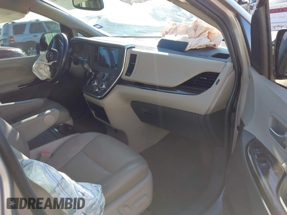 2015 Toyota Sienna XLE with VIN 5TDYK3DC8FS547056, listed as a IAAI auction lot 41387793 with 140,767 mi miles and . Bid and sale history available at DreamBid. Image 5.