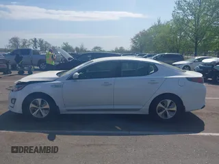 2014 Kia Optima LX z VIN KNAGM4AD8E5076052, wystawiony jako IAAI lot #42170715 z przebiegiem 111 448 mil mil oraz . Historia ofert i sprzedaży dostępna na DreamBid. Obrazek 14.