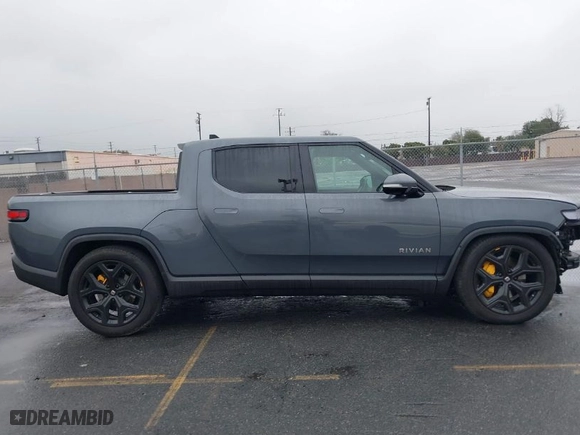 2022 Rivian R1T Adventure Package with VIN 7FCTGAAA7NN016044, listed as a IAAI auction lot 41540010 with 1 mi miles. Bid and sale history available at carsss.com. Image 13.