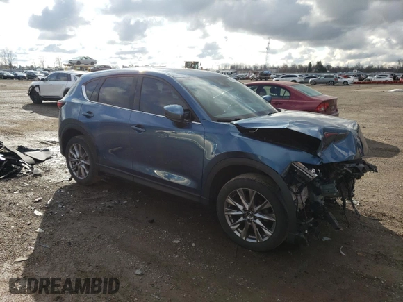 2019 Mazda CX-5 Grand Touring with VIN JM3KFBDM1K0649624, listed as a Copart auction lot 51340415 with 0 mi miles and Salvage Title. Bid and sale history available at carsss.com. Image 4.