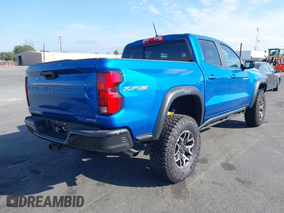 2024 Chevrolet Colorado 4WD ZR2 with VIN 1GCPTFEK4R1247340, listed as a IAAI auction lot 41690407 with 3,421 mi miles and . Bid and sale history available at DreamBid. Image 4.