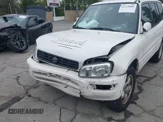 1999 Toyota RAV4 with VIN JT3GP10V3X7051445, listed as a IAAI auction lot 42115846 with 147,342 mi miles and . Bid and sale history available at DreamBid. Image 6.