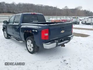 2007 Chevrolet Silverado 1500 LTZ with VIN 2GCEK13M771535698, listed as a IAAI auction lot 41295982 with 216,232 mi miles. Bid and sale history available at carsss.com. Image 3.