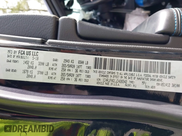 2018 Jeep Grand Cherokee Laredo E with VIN 1C4RJFAG1JC426542, listed as a IAAI auction lot 41729268 with 106,024 mi miles and . Bid and sale history available at DreamBid. Image 9.