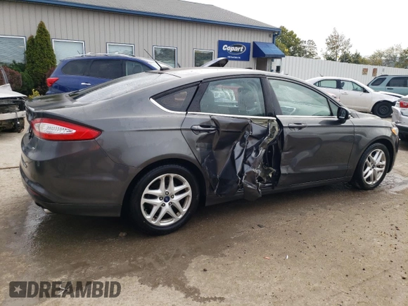 2015 Ford Fusion SE with VIN 3FA6P0H75FR150109, listed as a Copart auction lot 71594144 with 121,811 mi miles and Salvage Title. Bid and sale history available at DreamBid. Image 3.