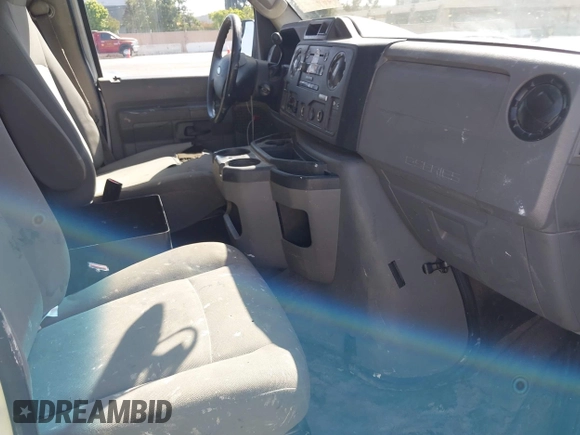2013 Ford Econoline Cargo Commercial with VIN 1FTNE1EW7DDA98789, listed as a IAAI auction lot 42382594 with 251,602 mi miles and . Bid and sale history available at DreamBid. Image 5.