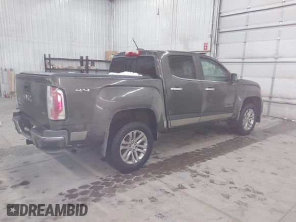 2019 GMC Canyon 4WD SLT with VIN 1GTG6DEN8K1356749, listed as a IAAI auction lot 41359981 with 85,461 mi miles. Bid and sale history available at carsss.com. Image 4.