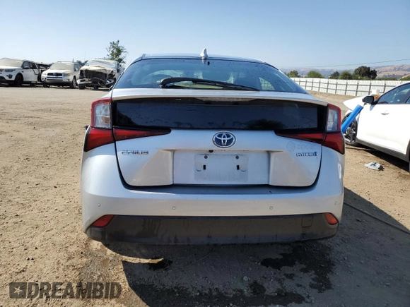 2022 Toyota Prius L Eco с VIN JTDKAMFU1N3177721, выставлен на аукционе Copart как лот 62401865 с пробегом 74 785 миль миль и Списание • Salvage title. История ставок и продаж доступна на DreamBid. Изображение 6.
