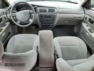 2007 Ford Taurus SE z VIN 1FAFP53U87A138588, wystawiony jako Copart lot #56965245 z przebiegiem Nie podano mil oraz Szkoda całkowita • Salvage title. Historia ofert i sprzedaży dostępna na DreamBid. Obrazek 8.