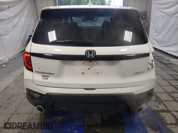 2024 Honda Passport EX-L с VIN 5FNYF8H54RB020153, выставлен на аукционе Copart как лот 59444465 с пробегом 13 958 миль миль и Списание • Salvage title. История ставок и продаж доступна на DreamBid. Изображение 6.