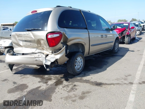 2003 Dodge Caravan Sport with VIN 2D4GP44R73R279132, listed as a IAAI auction lot 42100140 with 218,201 mi miles and . Bid and sale history available at carsss.com. Image 4.