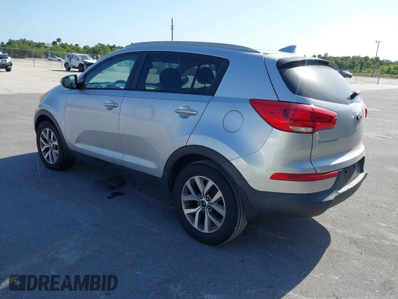 2015 Kia Sportage LX with VIN KNDPB3ACXF7791978, listed as a IAAI auction lot 42131383 with 140,533 mi miles and . Bid and sale history available at carsss.com. Image 3.