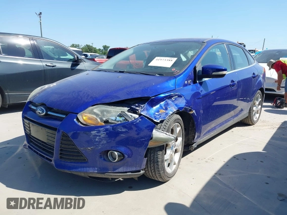 2013 Ford Focus Titanium with VIN 1FADP3J25DL163591, listed as a IAAI auction lot 41973388 with 133,071 mi miles and . Bid and sale history available at carsss.com. Image 2.