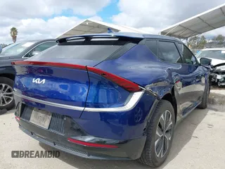 2022 Kia EV6 Wind with VIN KNDC34LA2N5049730, listed as a IAAI auction lot 41793235 with 109,806 mi miles and . Bid and sale history available at DreamBid. Image 4.
