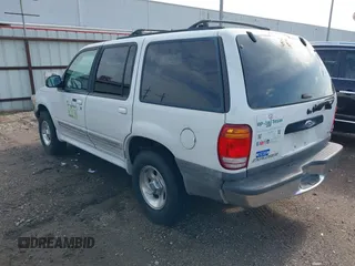 1999 Ford Explorer XLT z VIN 1FMZU32E9XZB70428, wystawiony jako IAAI lot #42697066 z przebiegiem 183 745 mil mil oraz . Historia ofert i sprzedaży dostępna na DreamBid. Obrazek 3.