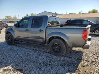2018 Nissan Frontier PRO-4X with VIN 1N6AD0EV7JN766614, listed as a Copart auction lot 76400834 with 180,560 mi miles and Salvage Title. Bid and sale history available at carsss.com. Image 2.