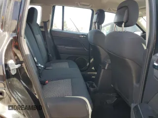 2010 Jeep Compass Sport with VIN 1J4NF4FB2AD591523, listed as a Copart auction lot 48809775 with 105,720 mi miles and Salvage Title. Bid and sale history available at carsss.com. Image 11.