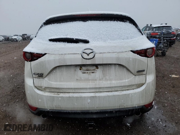 2018 Mazda CX-5 Grand Touring with VIN JM3KFBDM2J0405902, listed as a Copart auction lot 53731175 with 85,740 mi miles and Salvage Title. Bid and sale history available at DreamBid. Image 6.