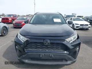 2019 Toyota RAV4 XLE with VIN JTMW1RFV7KJ011556, listed as a IAAI auction lot 41682178 with 72,795 mi miles. Bid and sale history available at carsss.com. Image 12.
