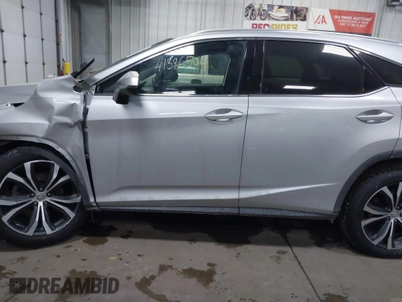 2017 Lexus RX with VIN 2T2BZMCAXHC067275, listed as a IAAI auction lot 41386504 with 100,477 mi miles. Bid and sale history available at carsss.com. Image 14.