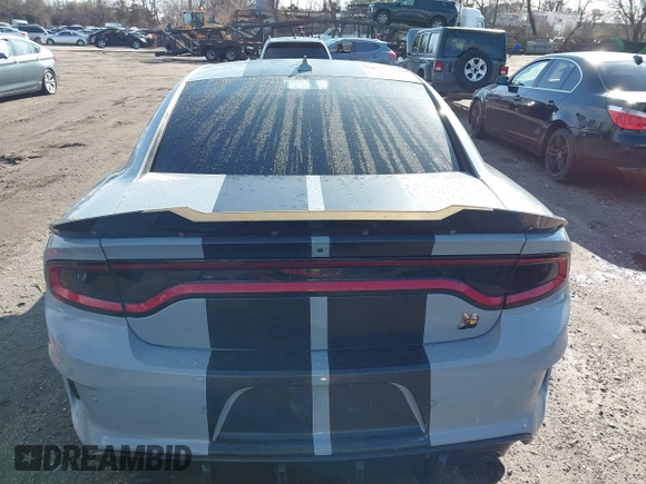 2022 Dodge Charger Scat Pack Widebody with VIN 2C3CDXGJ6NH176650, listed as a IAAI auction lot 41863122 with 34,569 mi miles and . Bid and sale history available at DreamBid. Image 16.