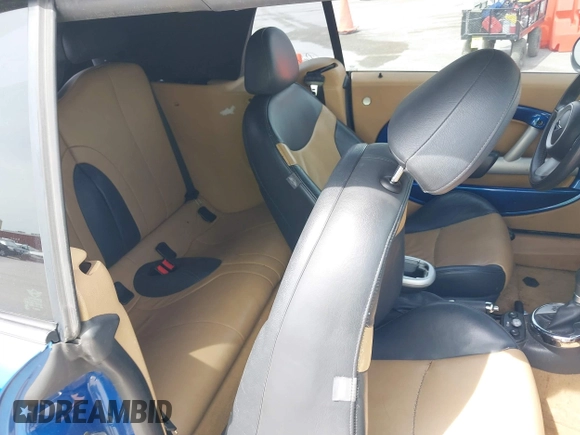 2006 MINI Convertible S with VIN WMWRH335X6TK59110, listed as a IAAI auction lot 42089085 with 101,303 mi miles and . Bid and sale history available at DreamBid. Image 8.