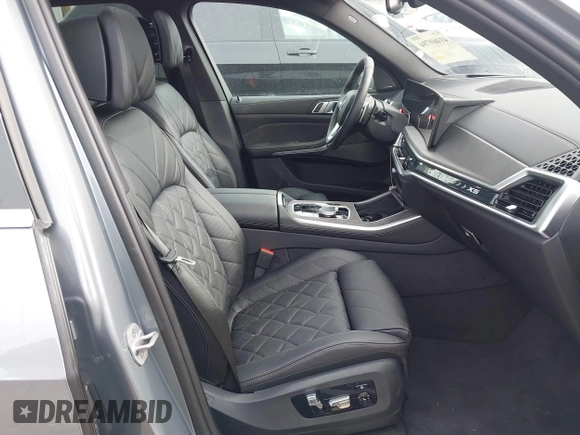 2025 BMW X5 xDrive40i with VIN 5UX23EU02S9X44610, listed as a IAAI auction lot 41469794 with 1,964 mi miles. Bid and sale history available at carsss.com. Image 5.