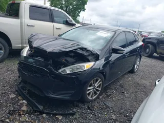 2018 Ford Focus SE with VIN 1FADP3F24JL248653, listed as a IAAI auction lot 42416377 with 113,856 mi miles and . Bid and sale history available at DreamBid. Image 2.