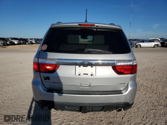 2013 Dodge Durango Crew with VIN 1C4SDHDT0DC590172, listed as a Copart auction lot 80140034 with 135,078 mi miles and Salvage title. Bid and sale history available at DreamBid. Image 6.