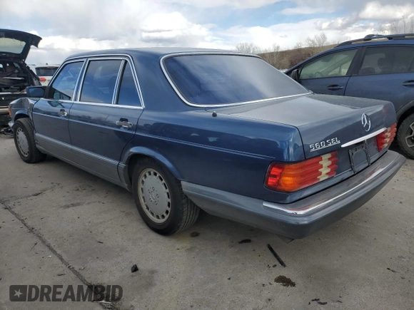 1986 Mercedes-Benz 560 with VIN WDBCA39D0GA267806, listed as a Copart auction lot 49870225 with 117,401 mi miles and Clean Title. Bid and sale history available at DreamBid. Image 2.
