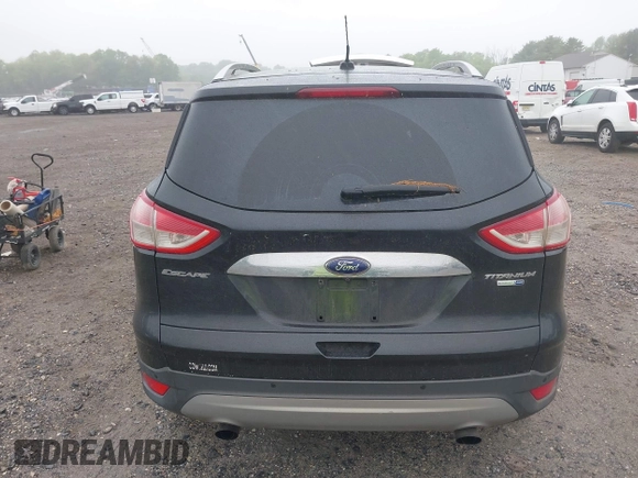 2014 Ford Escape Titanium with VIN 1FMCU9J90EUC24898, listed as a IAAI auction lot 42166523 with 152,464 mi miles and . Bid and sale history available at DreamBid. Image 16.