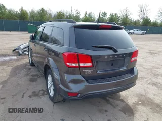 2019 Dodge Journey SE with VIN 3C4PDCBB8KT732028, listed as a IAAI auction lot 41902938 with 49,378 mi miles and . Bid and sale history available at DreamBid. Image 3.