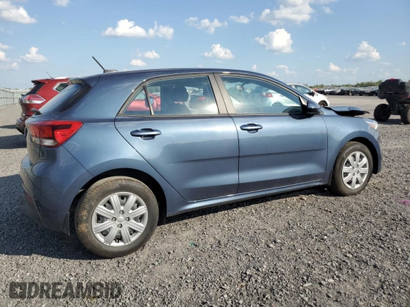2023 Kia Rio S with VIN 3KPA25AD5PE548218, listed as a Copart auction lot 71808674 with 24,412 mi miles and Salvage Title. Bid and sale history available at DreamBid. Image 3.