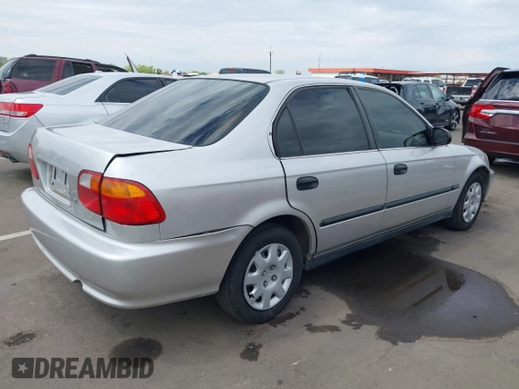 1999 Honda Civic LX with VIN JHMEJ6671XS003027, listed as a IAAI auction lot 41825146 with 197,764 mi miles and . Bid and sale history available at DreamBid. Image 4.
